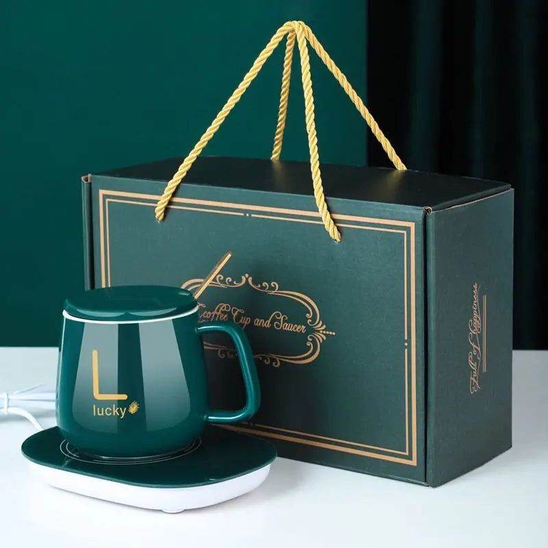 Green ceramic mug with warmer and matching saucer set with gold lucky design from Clarify pk
