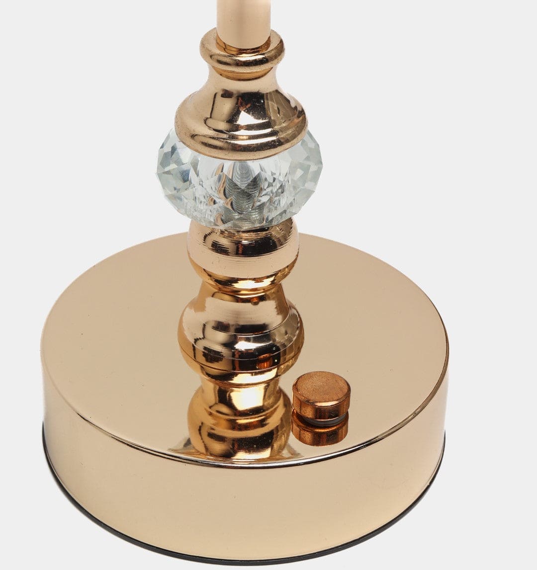 Close-up of the gold base with crystal detail of the butterfly table lamp from Clarify.pk