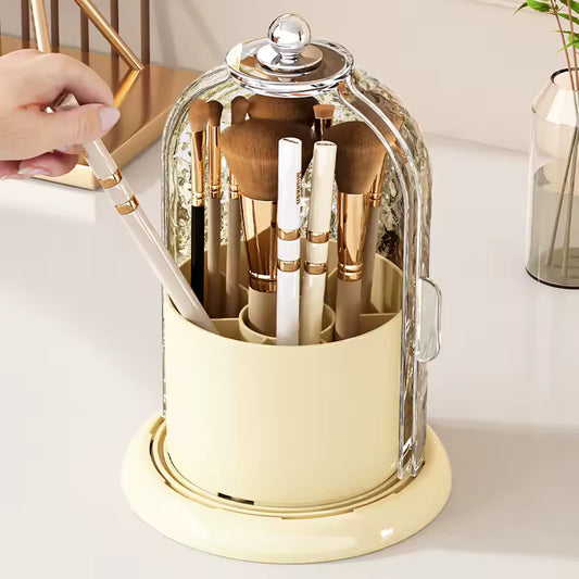 Clarify.pk luxury cosmetics storage box with clear dome and multiple compartments holding makeup brushes