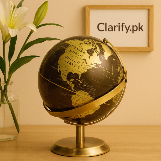 Luxury decorative world globe in black and gold on brass stand for elegant home decor by Clarify.pk