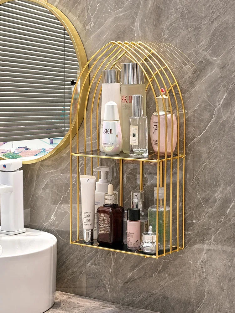 Luxury gold storage rack for bathroom mounted on wall holding skincare and beauty products