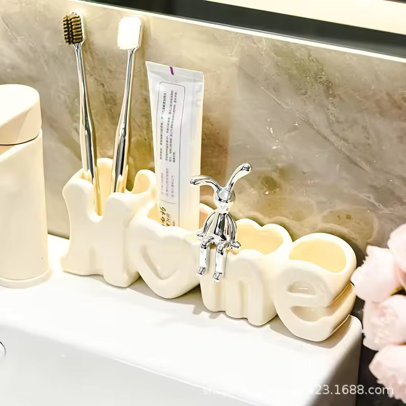 Luxury toothbrush holder for bathroom shaped with home letters holding toothbrushes and toothpaste