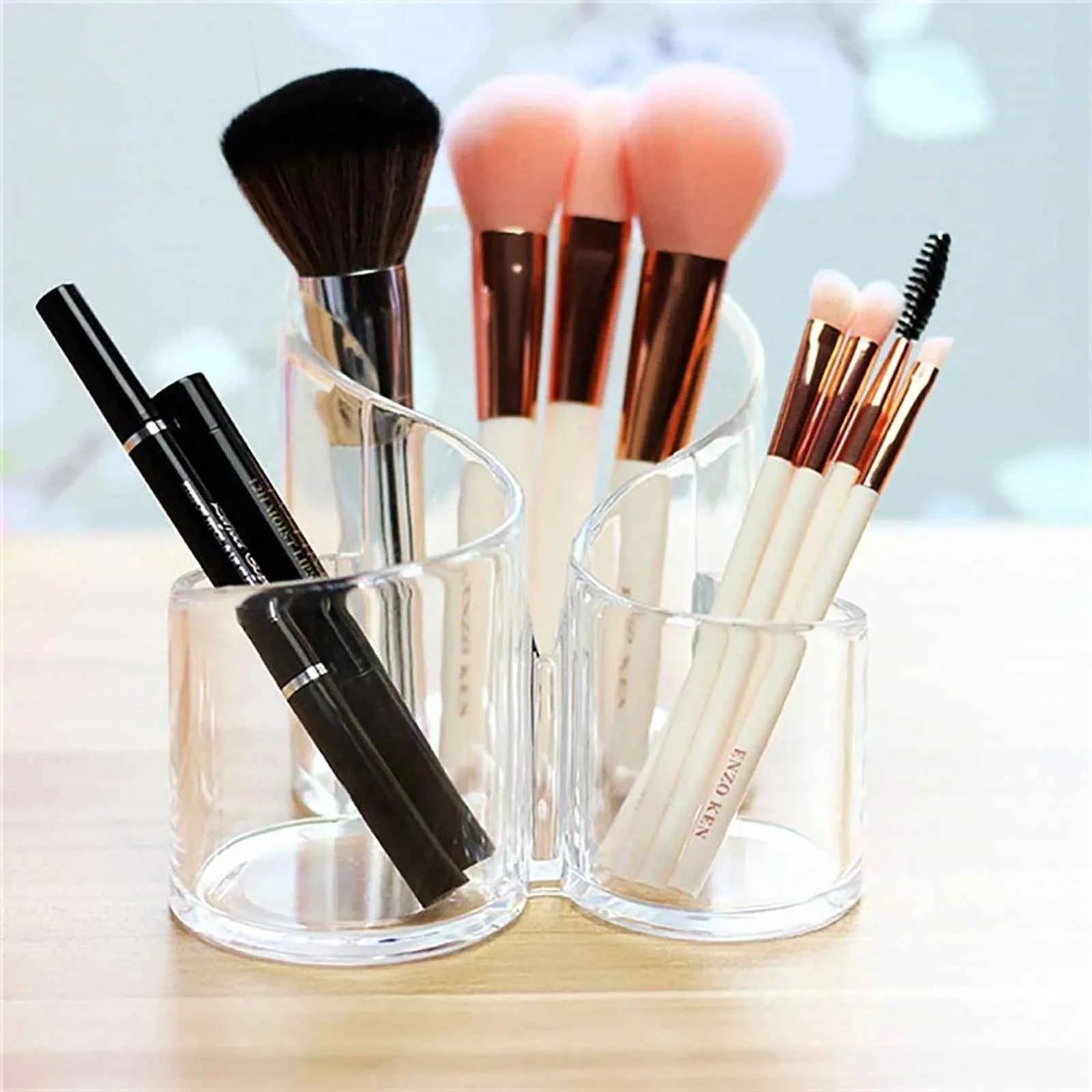 Stylish makeup brush holder acrylic with multiple compartments for organized storage of brushes and cosmetics