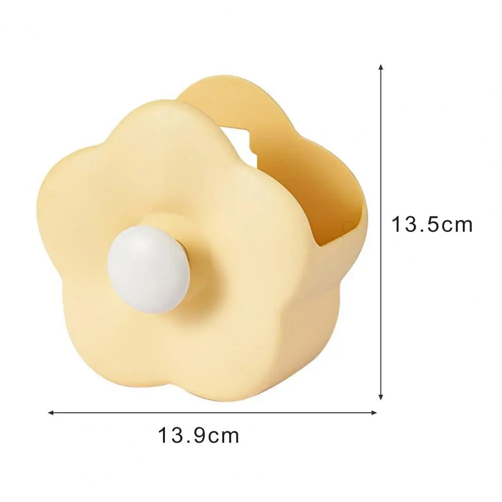 Yellow flower-shaped makeup brush organizer box with white knob and compact size from Clarify.pk