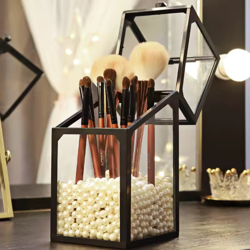 Clarify.pk makeup brush storage box with transparent sides and decorative white pearls holding makeup brushes