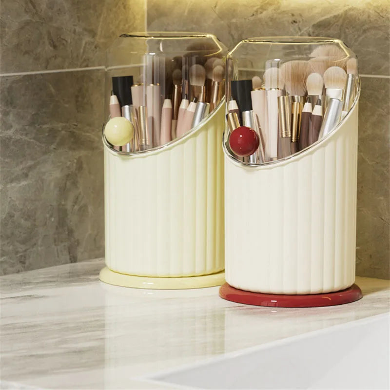 Clarify.pk makeup brush storage box holding various makeup brushes on a marble countertop