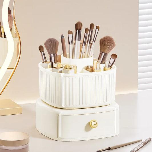 Clarify.pk white makeup brush storage box with gold accents holding various makeup brushes and tools