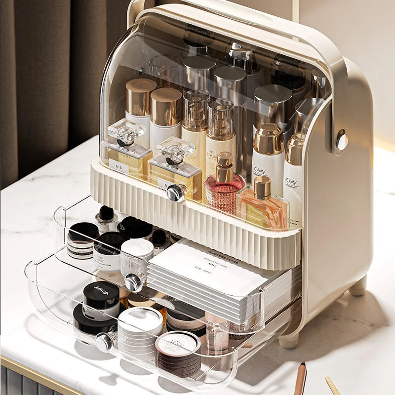 Makeup organizer storage with drawers holding various perfume bottles and cosmetic jars on a vanity table