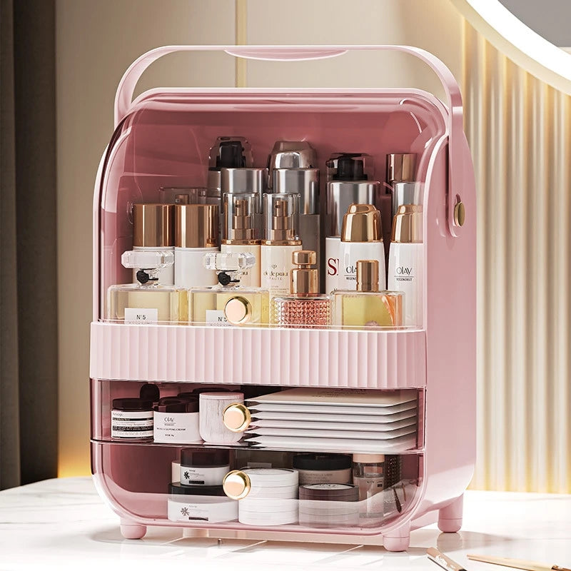 Pink makeup organizer storage with drawers holding various skincare and beauty bottles neatly