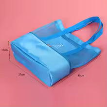 Clarify.pk blue mesh beach bag with pockets featuring spacious design and comfortable handles