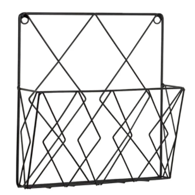 Black metal wall mounted rack with geometric wire design for organizing mail or small items