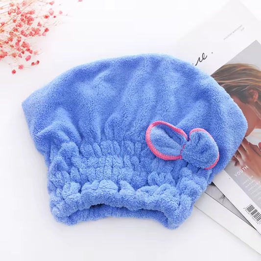 Blue microfiber hair drying towel cap with elastic band and decorative bow from Clarify.pk