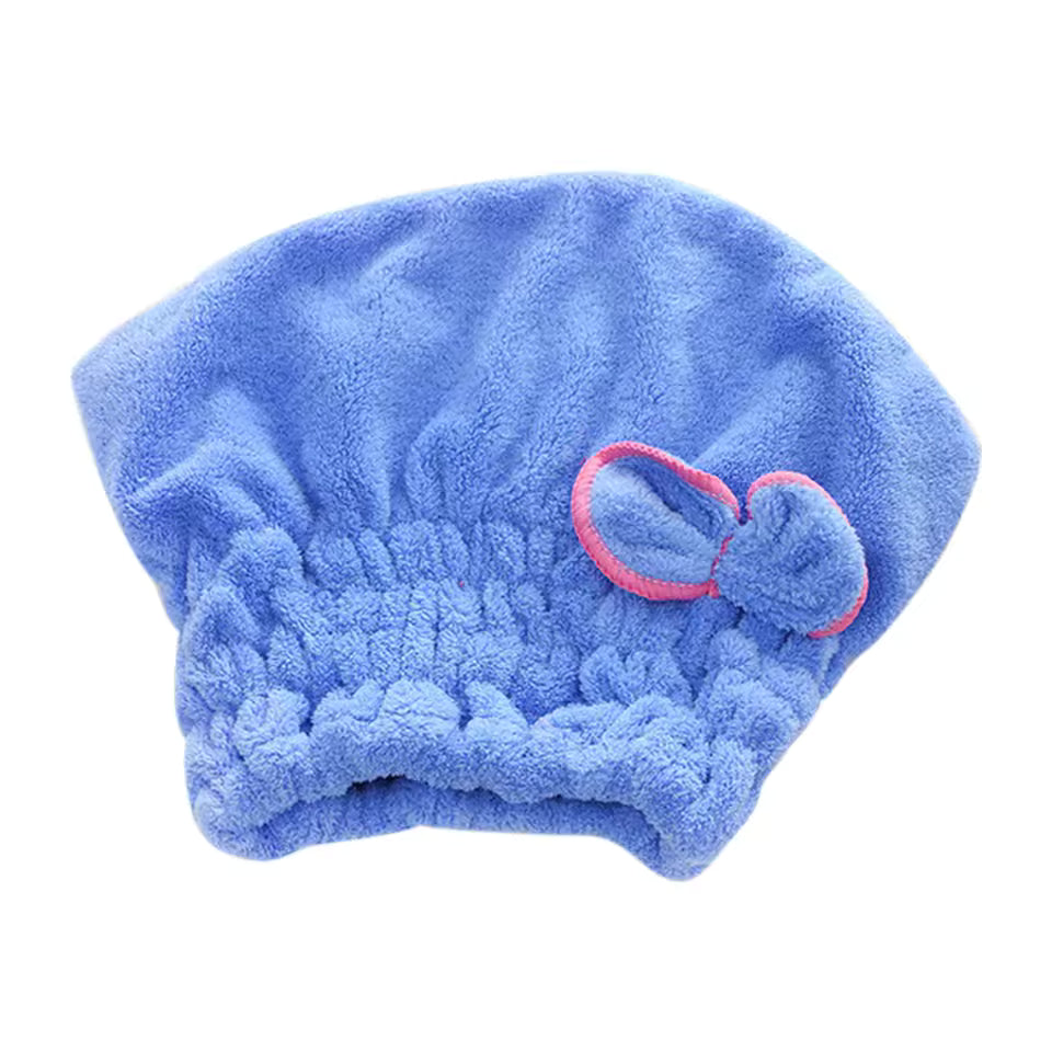 Blue microfiber hair drying towel cap with elastic band and bow detail for quick hair drying