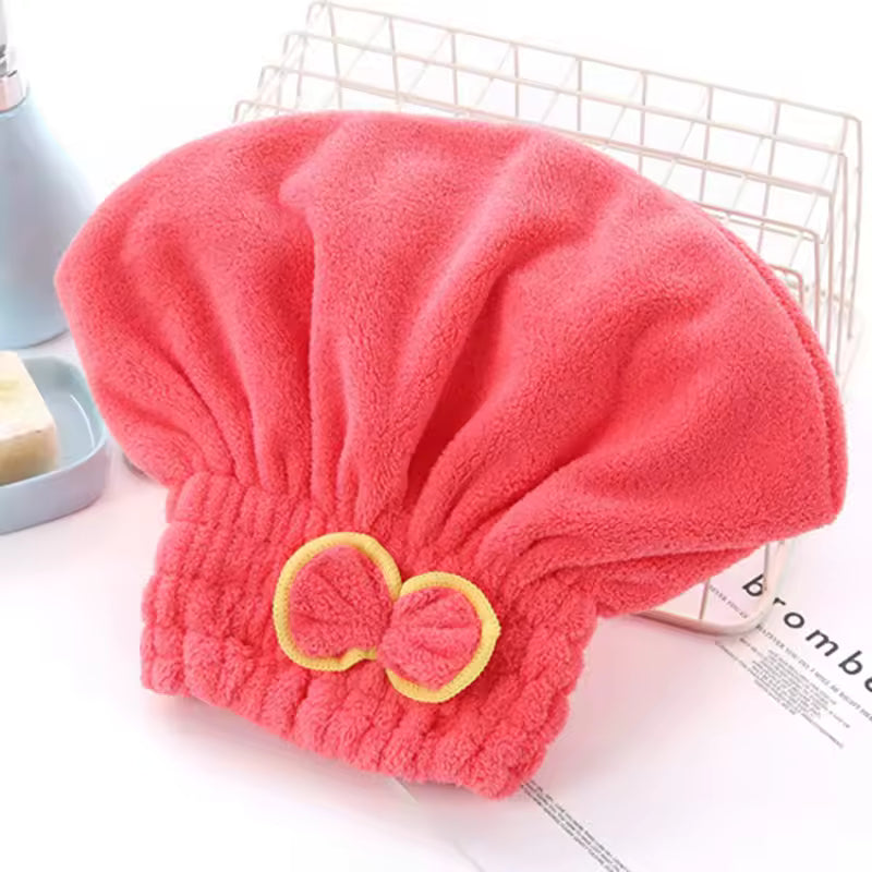 Clarify.pk microfiber hair drying towel cap in coral pink with yellow bow detail and elastic band