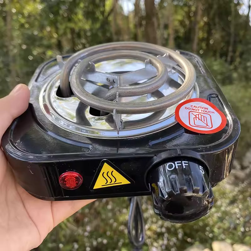 Clarify.pk mini electric stove coal burner with temperature control knob and safety warning labels