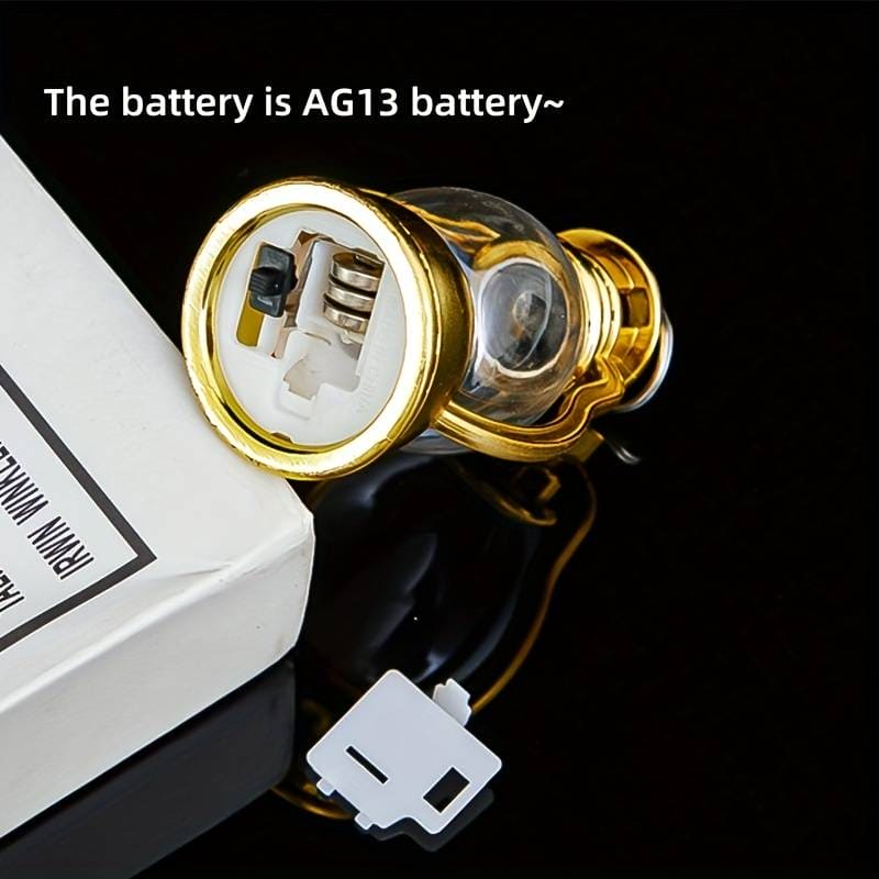 Mini lantern lamp for home decor showing gold base and AG13 battery compartment
