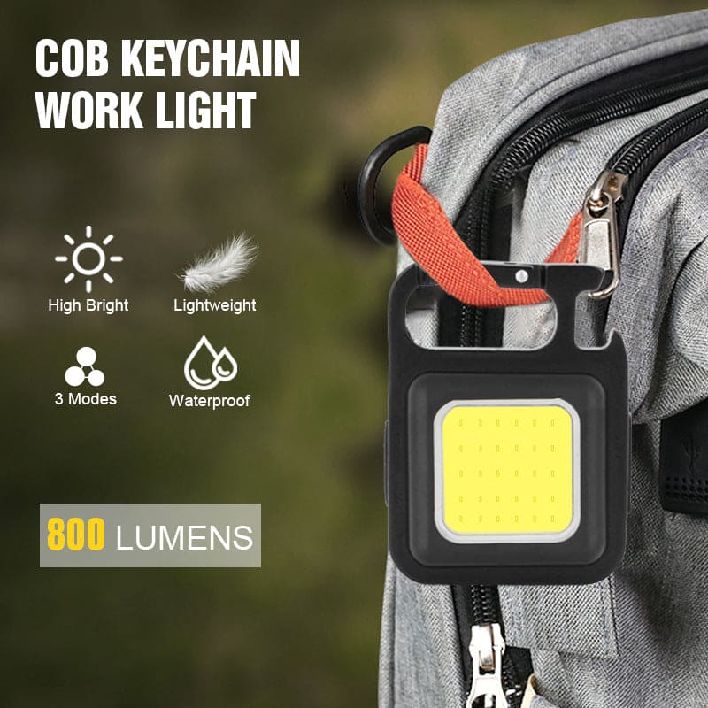 Clarify.pk mini LED flashlight keychain attached to backpack with 800 lumens high bright lightweight waterproof design