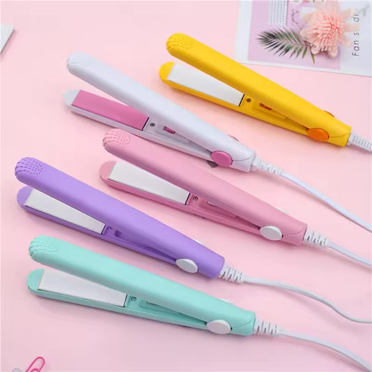 Colorful mini portable hair straightener set in yellow, white, pink, purple, and mint green on a pink background