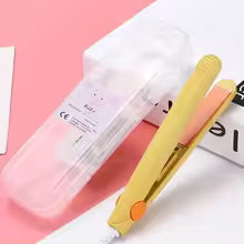Mini portable hair straightener in yellow with protective clear plastic travel case