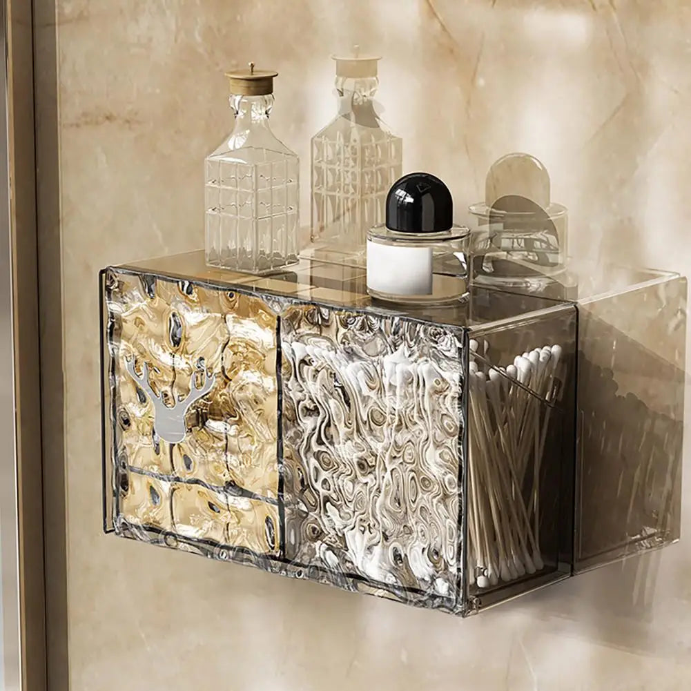 Clear acrylic cotton pad storage container mounted on wall holding cotton pads and cotton swabs