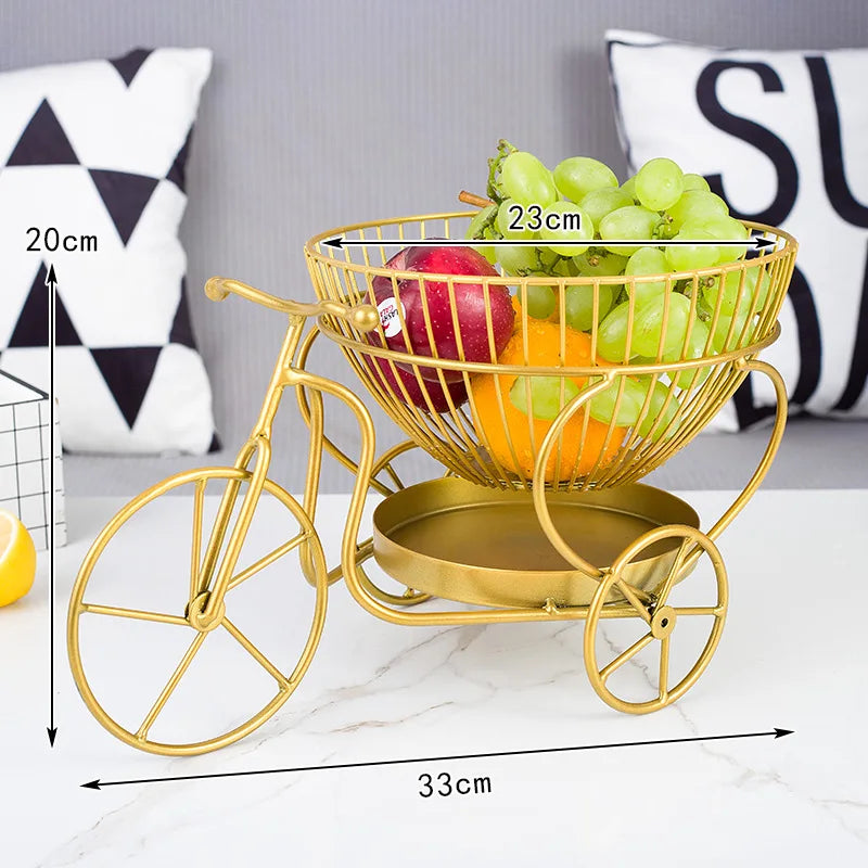 Clarify.pk modern fruit basket in gold metal tricycle design holding grapes and orange