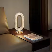 Modern luxurious nordic desk lamp illuminating a stylish living room side table with books