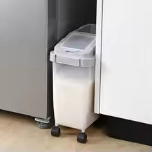 Clarify.pk moisture proof rice storage container with wheels fits neatly between kitchen cabinets