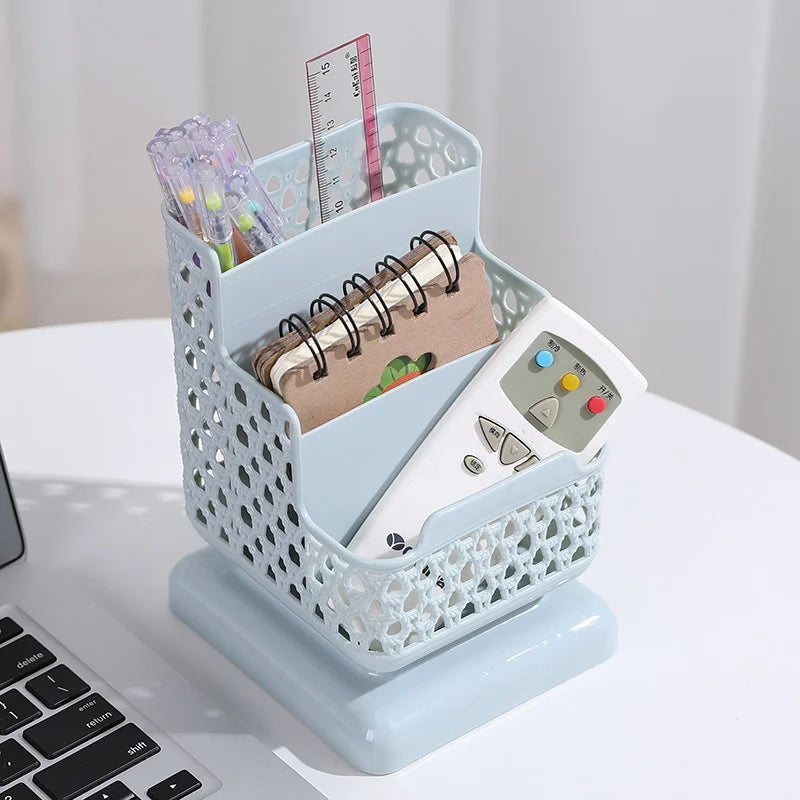 Clarify.pk multi compartment desk organizer in light blue holding pens, ruler, notebook, and remote control