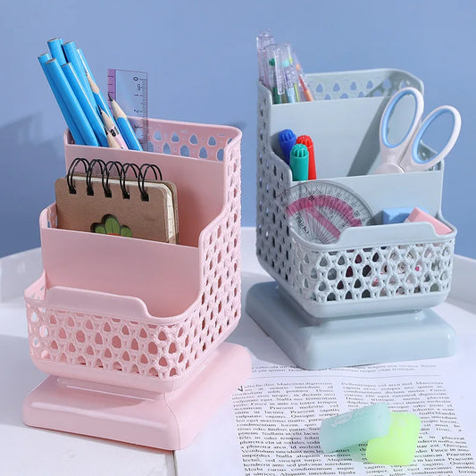 Clarify.pk multi compartment desk organizer in pink and gray holding pens, scissors, rulers, and notebooks