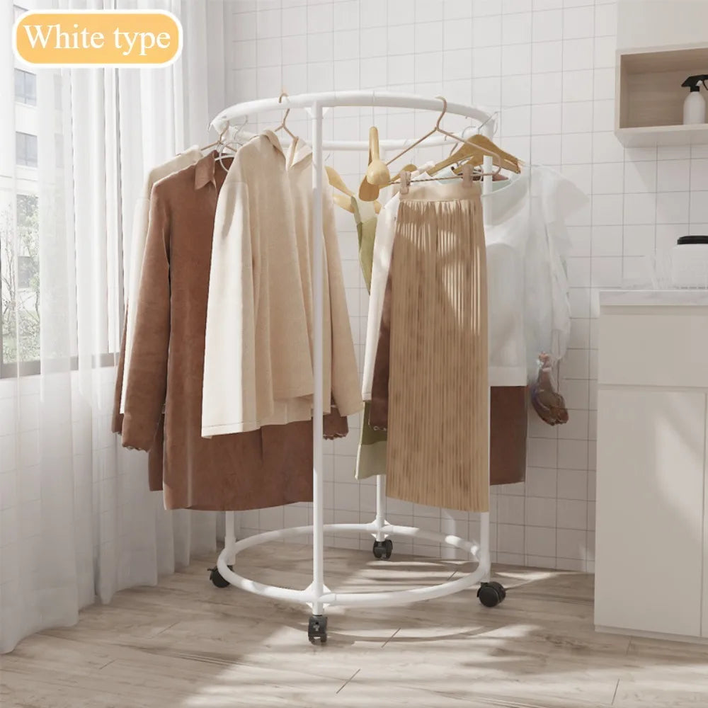 White multi functional coat hanger for clothes with circular design on wheels holding various clothing items