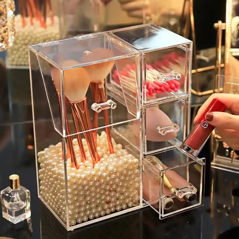 Clear multi-functional cosmetic organizer with brushes, cotton swabs, and lipstick on a black surface