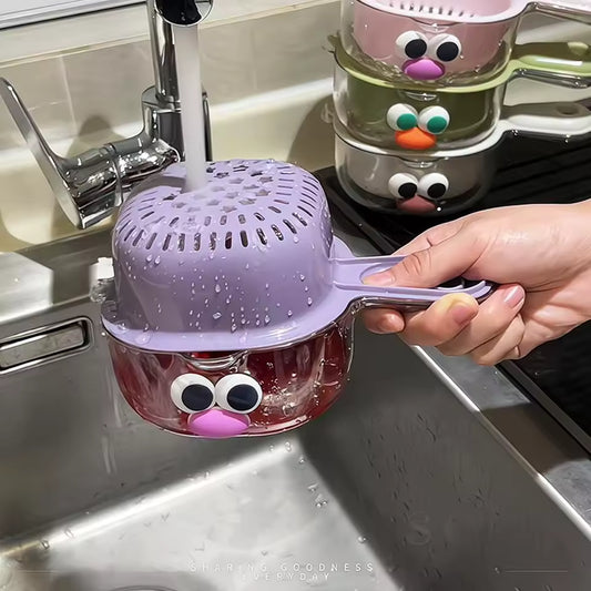 Clarify.pk multi-functional drain basket in purple being rinsed over kitchen sink with stacked colorful drain baskets in background