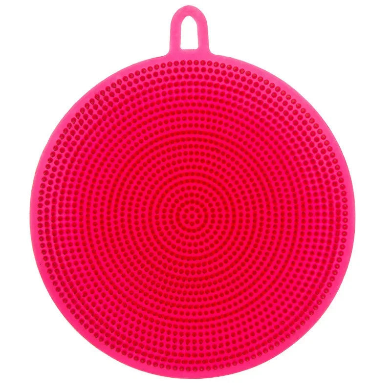 Pink round multi-functional kitchen scrubber with textured surface and hanging loop for easy storage