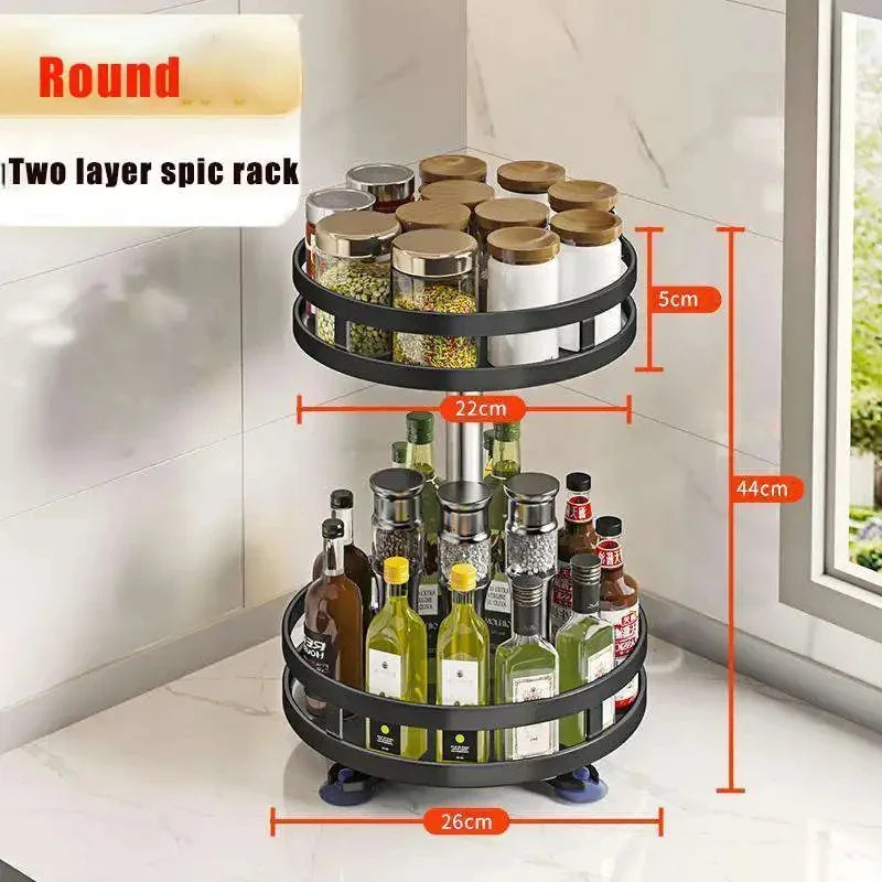 Round multi-layer kitchen storage organizer with two layers holding spice jars and bottles in black metal design