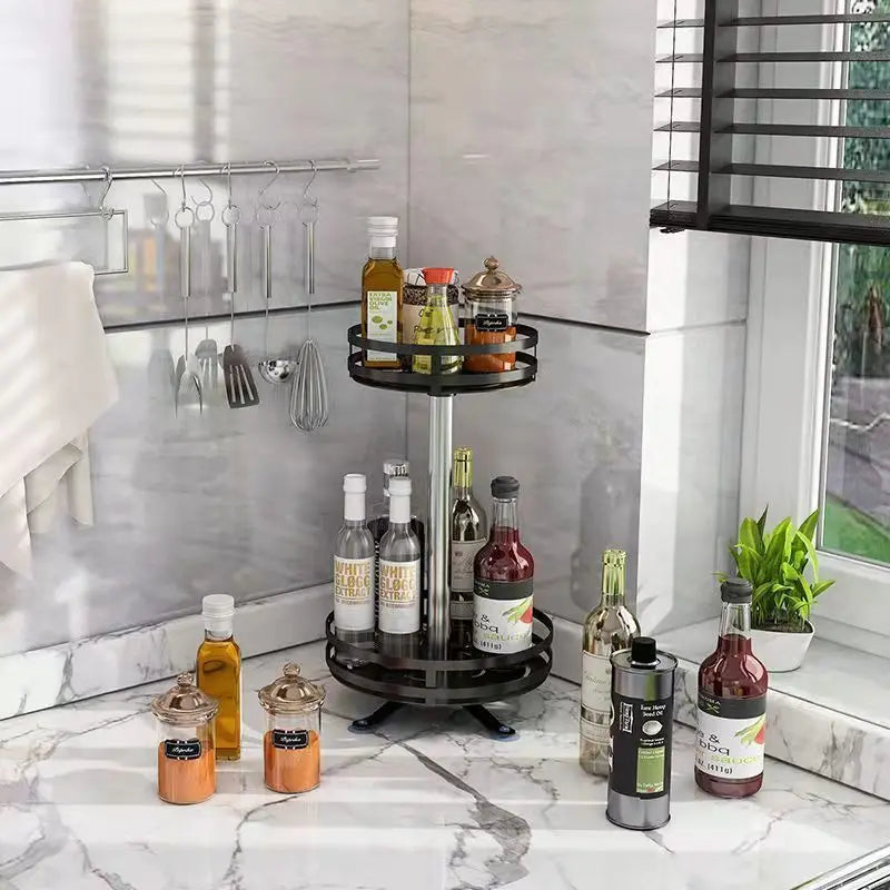 Multi-layer kitchen storage organizer holding bottles and spices on a marble countertop