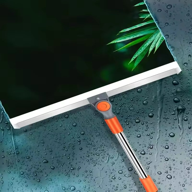 Clarify.pk multi-purpose floor mop with orange handle and wide cleaning head on wet surface