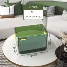 Green multi-purpose household storage box with handles placed on white round table in living room