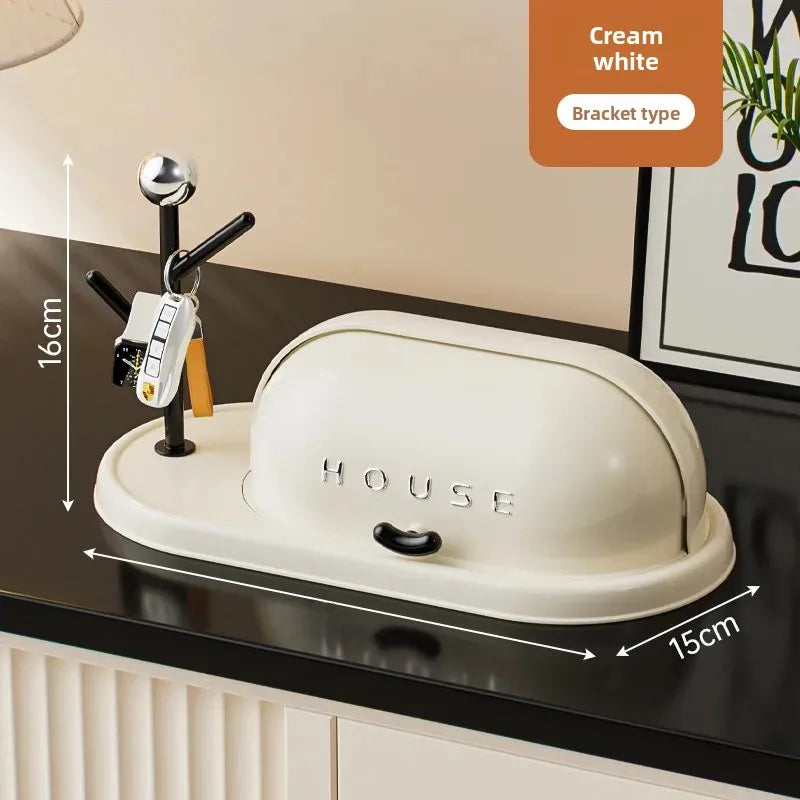 Cream white bracket type multi-purpose storage rack for home with key holder on black countertop