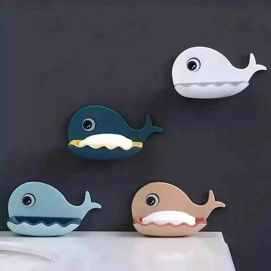 Set of colorful wall mounted fish soap dish in white, navy, teal, and beige for bathroom organization