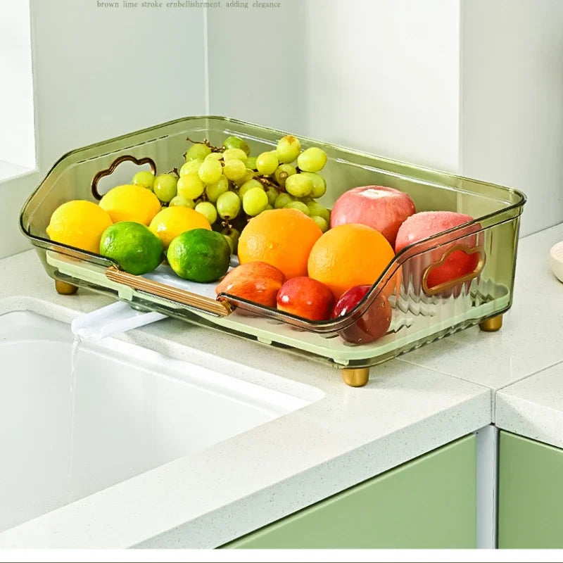 Multifunctional dish drainer with utensil holder by Clarify.pk holding fresh fruits on kitchen countertop
