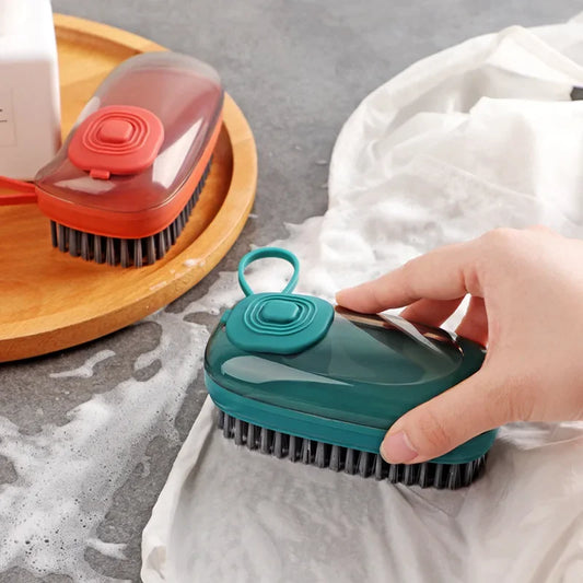 Clarify.pk multifunctional liquid brush in green and red with ergonomic handle and bristles for cleaning fabrics
