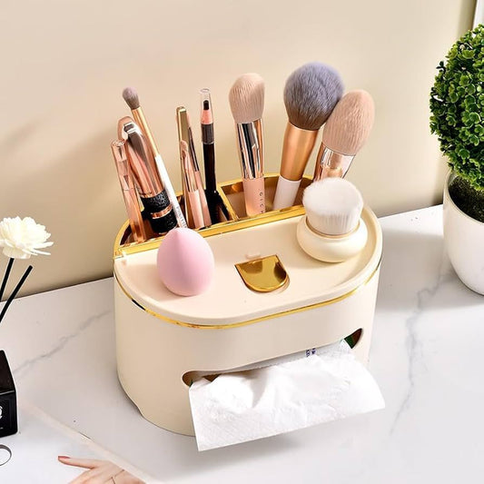 Clarify.pk multifunctional tissue box with makeup brush holder and gold accents on white surface