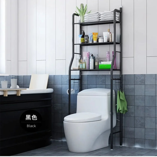Black multifunctional toilet rack over white toilet holding towels and toiletries in modern bathroom