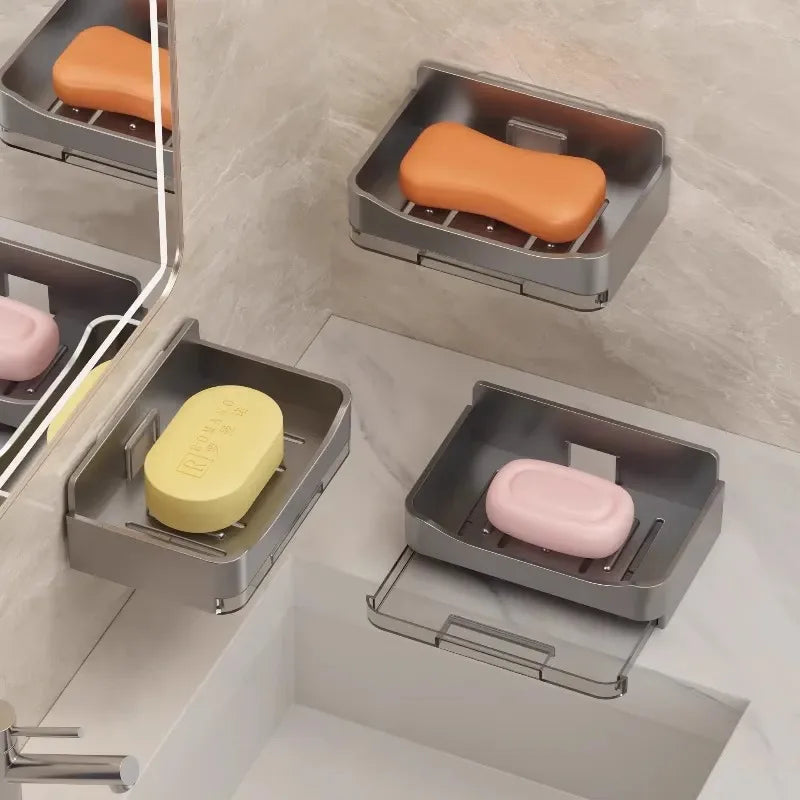 Clarify.pk wall mounted soap holder in gray with drainage slots holding multiple colorful soap bars