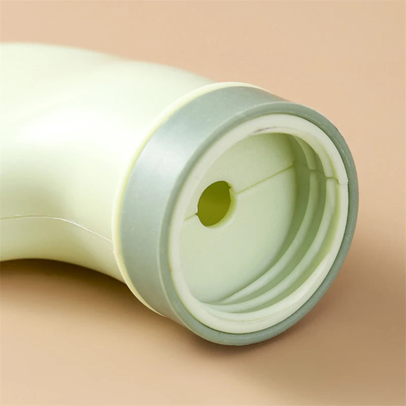 Close-up of a narrow space cleaning tool for bottles with a gray rim designed for tight bottle openings