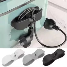 Clarify.pk cable management tool in black, white, and gray for organizing power cords and cables