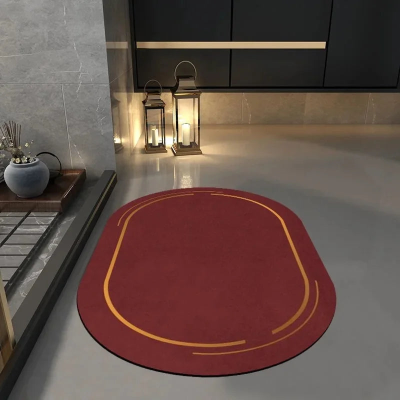 Red non slip bathroom mat with yellow border placed on a modern gray bathroom floor