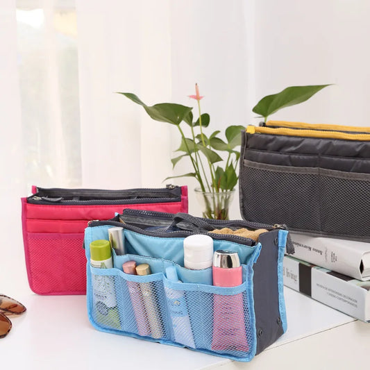 Clarify.pk nylon handbag organizer insert in blue pink and black with multiple compartments for storage and travel