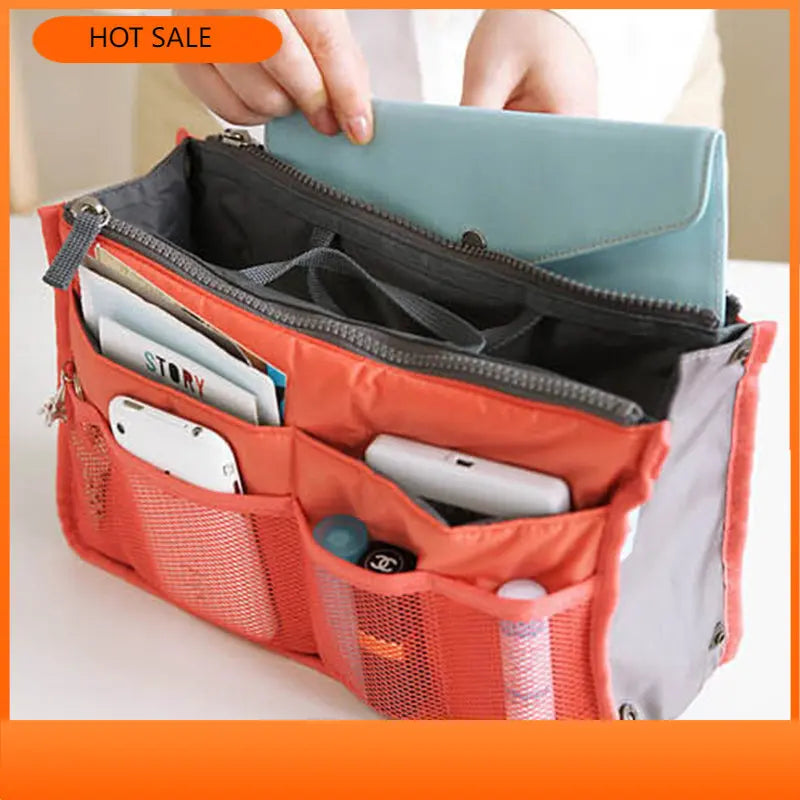 Clarify.pk orange nylon handbag organizer insert with multiple pockets holding wallet and phone