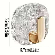 Pack of 4 self adhesive wall hooks with transparent textured base and gold metal hook